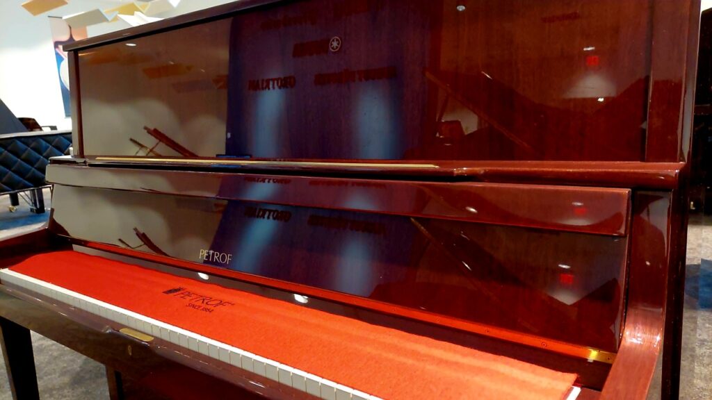 Premium upright piano, European, hand-built by Petrof. Immaculate, new-like, one only.